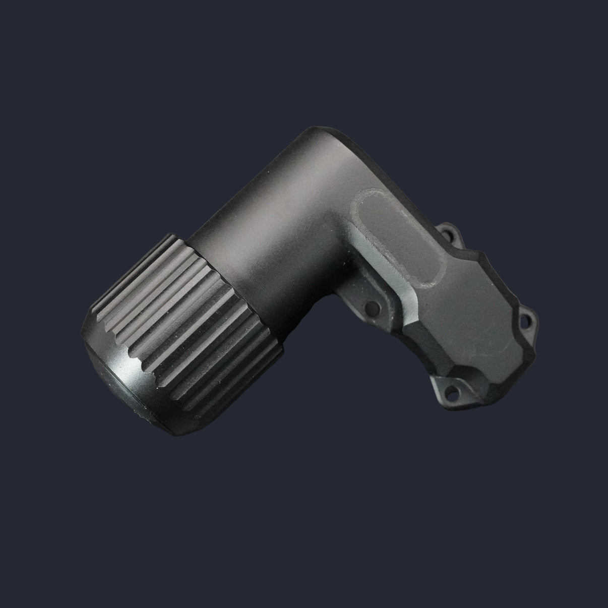 Black metal component on a dark gray background